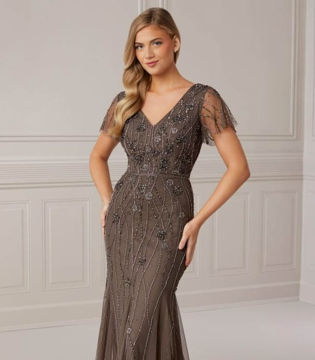 Model wearing a gray dress